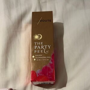 The Route The Party Peel Golden Illuminizing Peel - Gold & Pink Box